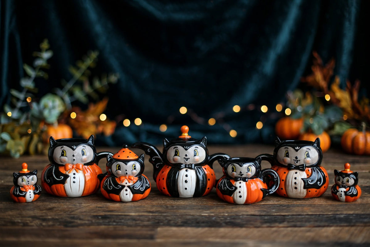 Johanna Parker Design for Transpac 2026 Dapper Bat seven-piece ceramic set in a dark Halloween display