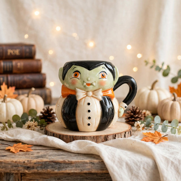 Dracula Mug by Johanna Parker Design for Transpac styled with autumn pumpkins and vintage books