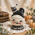 Loony Jack O Luna by Johanna Parker Design styled with vintage books and pumpkins